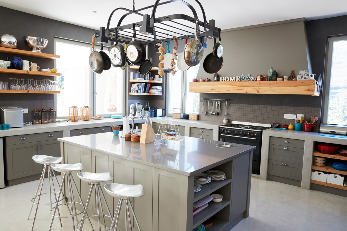 Kitchen Area Of Modern Home Interior With Island And Appliances