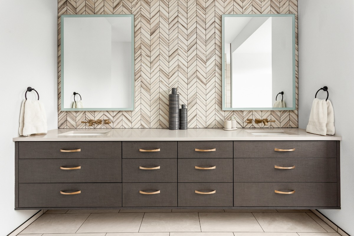 modern bathroom with floating double vanity and mirrors